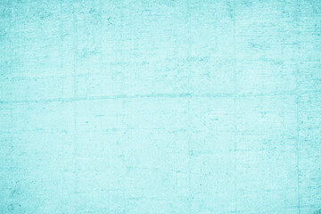 Grungy blue textured paper background with faded watercolor paint stains.