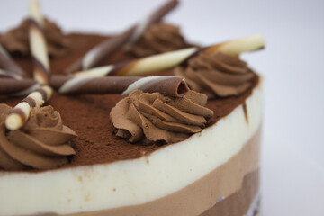 Decadent Chocolate Cake with Cream Swirls