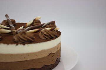 Decadent Chocolate Cake with Cream Swirls