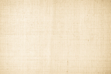 Closeup detail of beige fabric texture background. High resolution photo.