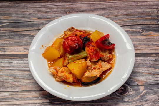 Traditional delicious Turkish dishes; potato, tomato, pepper, garlic and meat dish (Turkish name; Fırında tas kebabı,)