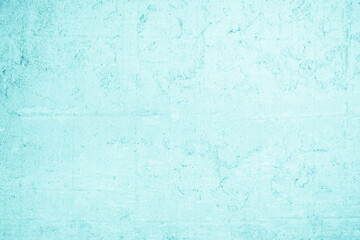 Grungy blue textured paper background with faded watercolor paint stains.