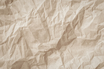Crumpled brown paper texture background for design with copy space for text or image.	