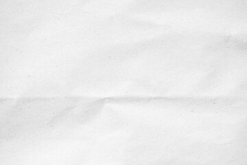 White recycled craft paper texture as background. Grey paper texture, Old vintage page or grunge vignette of old newspaper. Pattern rough art creased grunge letter. Hardboard with copy space for text.