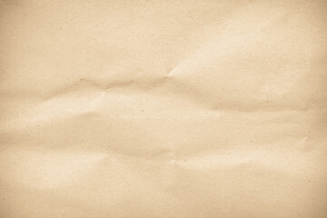 Crumpled brown paper texture background for design with copy space for text or image.	