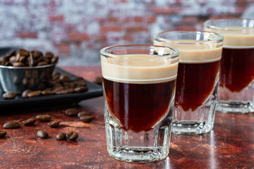 St. Patrickâ€™s Day cocktail of layered Irish cream and coffee liqueur made to look like mini stout shot