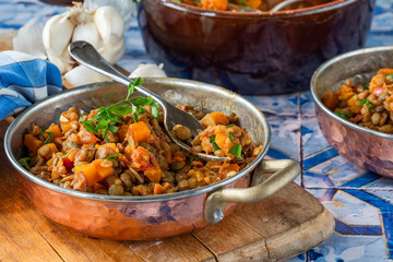 Brown lentils stew with white wine, serrano ham and smoked paprika