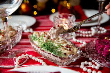 Festive fish table with gubbrora salad - traditional Swedish starter dish with fish. Celebration delicacies