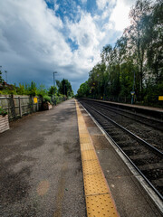Fototapeta premium railway platform with flowers