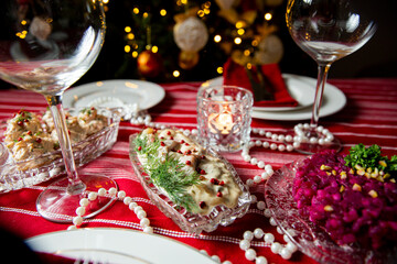 Festive fish table with gubbrora salad - traditional Swedish starter dish with fish. Celebration delicacies