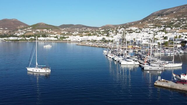 Aerial Revealing over Parikia Marina full of Sailing Boats, Greece