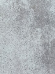 Fototapeta premium A grey and white wall with a few spots of color
