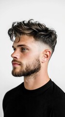 Fototapeta premium A man with a shaved head and a beard