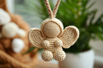 Fototapeta premium Adorable handmade crochet angel doll brings joy to your home decor and gifts