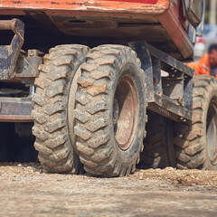 Public city street reconstrunction with heavy machines.