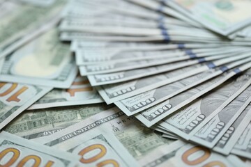 Big amount of american USD hunderd dollar bills banknotes close up