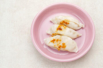 Choipan, made from rice flour filled with shredded jicama and sprinkled with fried garlic. Traditional steamed snack from Pontianak, Indonesia.
