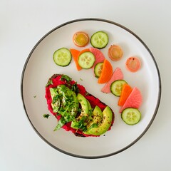 Toast with Beet Hummus with Avocado and Veggies