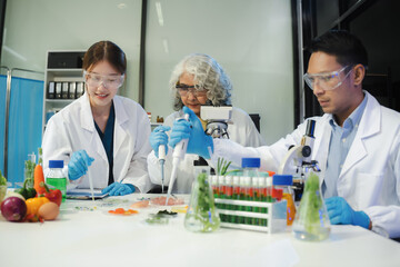 Fototapeta premium Microbiologist Working on Molecule Samples in Modern Food Science Laboratory.