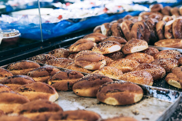 Traditional Turkish breakfast spread featuring simit, açma, and poğaça pastries, offering a delicious assortment of baked goods that capture the essence of Turkish morning flavors and textures.