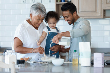 Happy family, baking and child in kitchen with help, skills development and making cupcakes for Thanksgiving. Grandmother, man and kid at home with secret recipe, milk ingredients or learning support