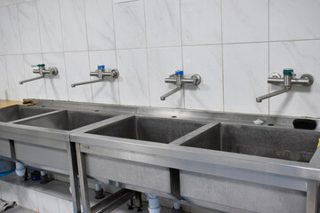 A sink for dishes in the dining room