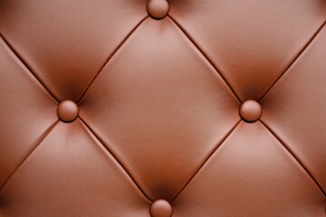 Naklejka premium Elegant rich chocolate brown leather texture with detailed stitching for luxury branding mockups in creative design projects