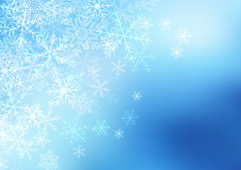 Christmas snowflakes on a blue defocussed background 