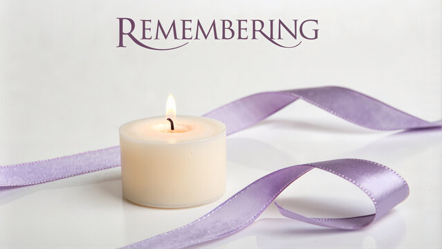 Single candle with purple ribbon, remembering loved ones

