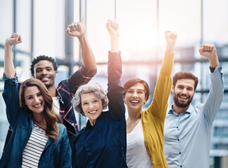 Celebration, portrait and business team with fist in office for confidence, motivation and teamwork. Happy, success and group of multiracial corporate employees to celebrate achievement in workplace.
