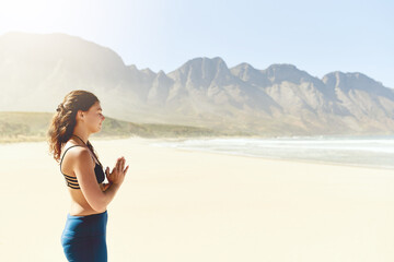 Namaste, meditation and woman at ocean with morning peace, healthy balance or wellness for holistic care. Zen, relax and girl at beach for mindfulness, wellbeing and space for outdoor yoga in nature