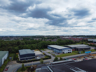High Angle View of Industrial Estate and Warehouses at Leeds City of United Kingdom. Aerial Footage Was Captured with Drone's Camera on June 12th, 2024 from Medium High Altitude.