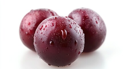 Close-up of fresh cherries with water droplets on their glossy, deep red skin, capturing the juicy texture and vibrant color, isolated on a white background.