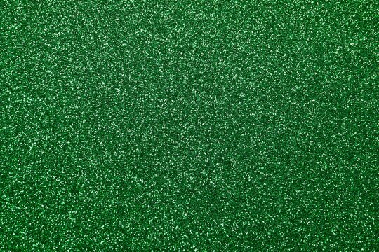 Shiny green glitter texture background