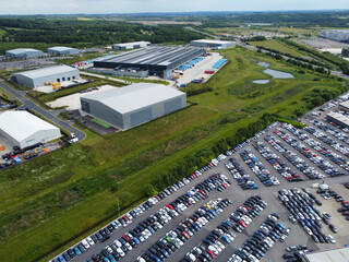 High Angle View of Industrial Estate and Warehouses at Leeds City of United Kingdom. Aerial Footage Was Captured with Drone's Camera on June 12th, 2024 from Medium High Altitude.