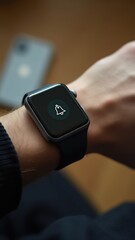 Smartwatch on hand showing bell icon, symbolizing notifications, reminders, and daily alerts for efficient time management.