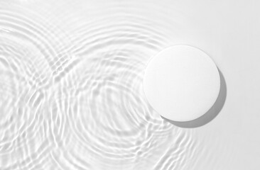 White round podium on the water surface background. Flat lay, copy space