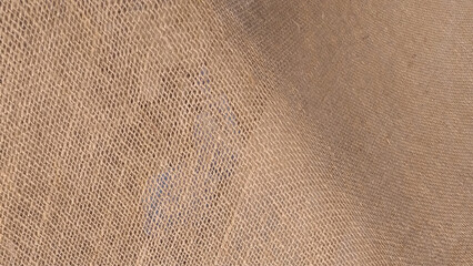 Jute pattern, rough burlap texture, canvas coarse cloth, brown woven rustic bagging. Threads background. Sackcloth surface, material