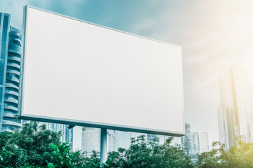 Fototapeta premium Blank urban billboard for advertising in a modern cityscape