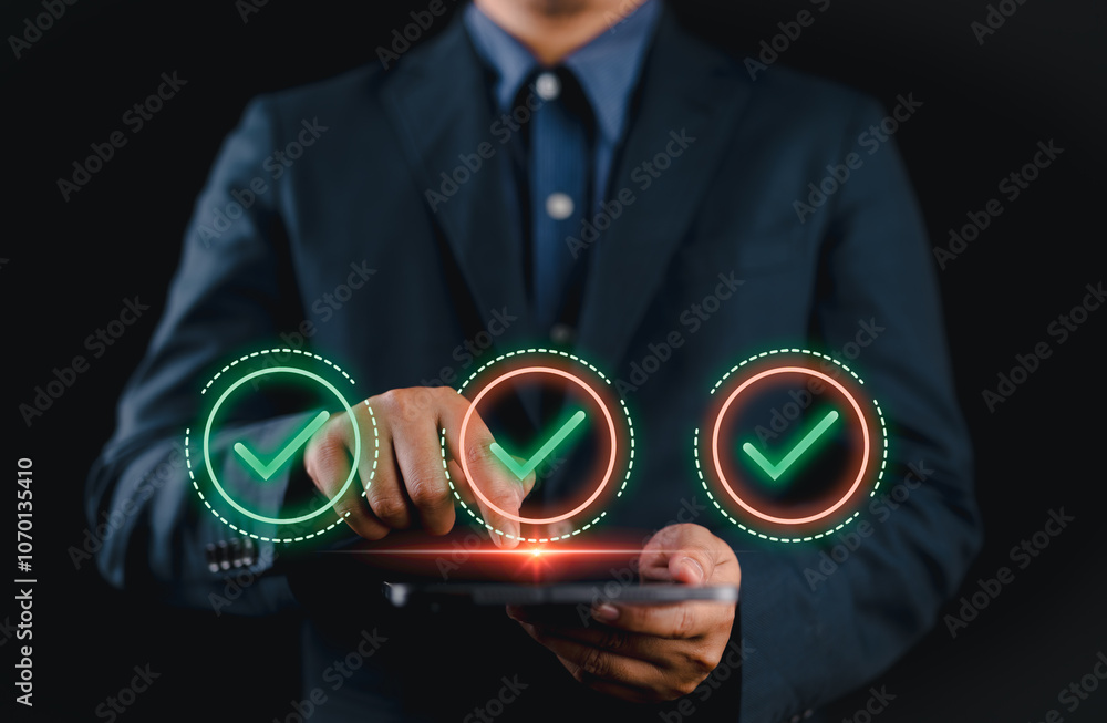 Poster businessman makes a checklist assessment and questionnaire, businessman using tablet to do online su