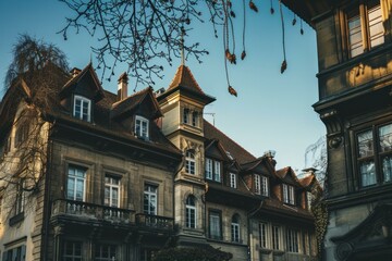 Sunlight bathes the elegant facades of historic european buildings, highlighting the intricate details of their architecture