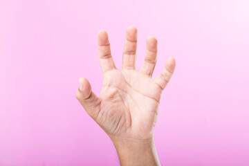 A hand displays various gestures, including a fist, open palm, and raised fingers, against a pink background. A visual exploration of communication through hand symbols