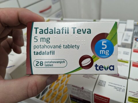 Prague, Czech Republic - July 10 2024: TADALAFIL TEVA box of medication with TADALAFIL active substance by TEVA, used for treatment of erectile dysfunction and benign prostatic hyperplasia.	

