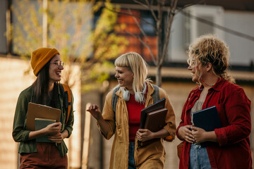 A Group of diverse students having fun outdoors in the city on a sunny summer day