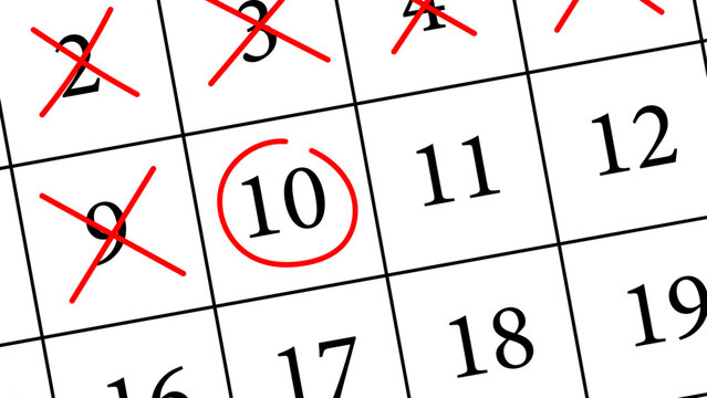 A calendar with red crosses marking past days and one circled date