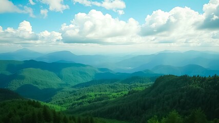 Naklejka premium A Panoramic View of Rolling Hills and Lush Forests Under a Clear Blue Sky with Puffy White Clouds