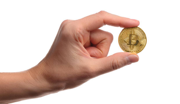 Bitcoin gold coin on the hand.