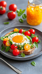 Enjoy wholegrain toast with orange marmalade and fresh vegetables for a healthy breakfast