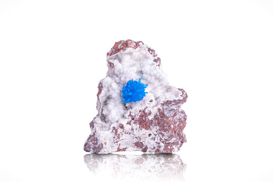 Cavansite crystals on stilbite photography isolated on white blackground. Specimen from Wagholi, India. macro detail  background. close-up mineral crystal unpolished semi-precious gemstone.
