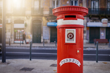 Red, mailbox and letters in city outdoor for delivery service, post writing and packages of...